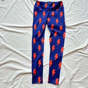 new without tags blue leggings with orange lightening bolts perfect for gameday